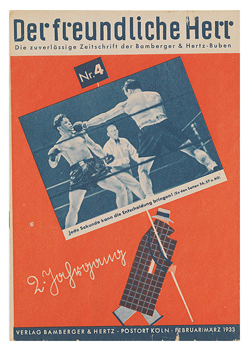 Magazine with a red-and-blue cover showing the Bamberger & Hertz logo, a man in a checkered jacket. Here he is shown carrying a sign with a picture of a boxing match
