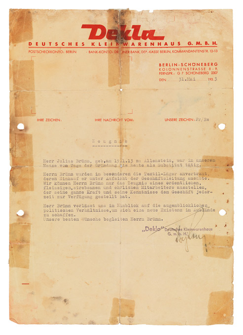 Brief typewritten reference with letterhead in red. The sheet of paper has several tears, which have been mended with adhesive tape.