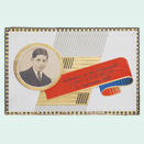 Wooden cigar box cover featuring colorful paper and a portrait photo of a boy