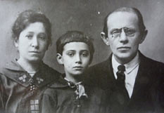 Black-and-white photo of the family: mother, son, and father