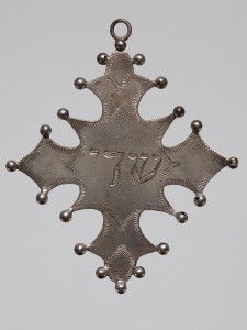Amulet in shape of a cross