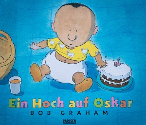 Book cover with little Oscar and a birthday cake