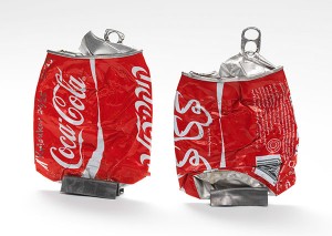 Crushed Coca-cola cans with Hebrew and Arabic letters