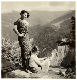 A woman and a young girl in the mountains