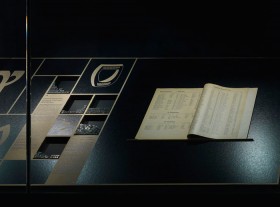 Detail of the showcase with an open booklet