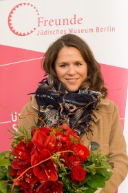 A young woman with a bouquet of flowers