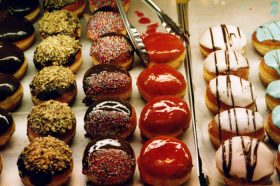 Many colorful doughnuts on display