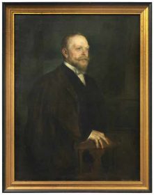 Oil painting of man with beard, black suit, and dark coat