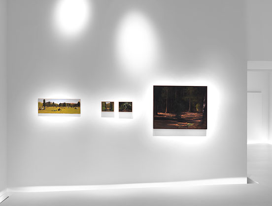view of a wall with four works of art 