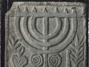 Detail from a book cover: Illustration of a menorah stone relief