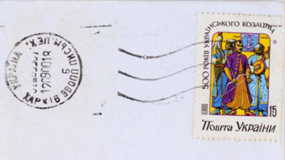 Abgestempelte ukrainische Briefmarke mit Darstellung von Kosaken