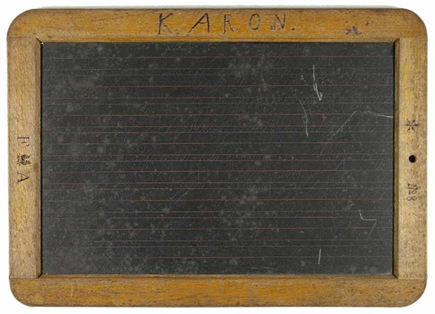 A blackboard with wooden frame with the inscription K. Aron.