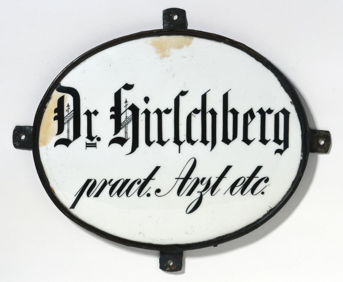 Dr. Hirschberg’s round office sign
