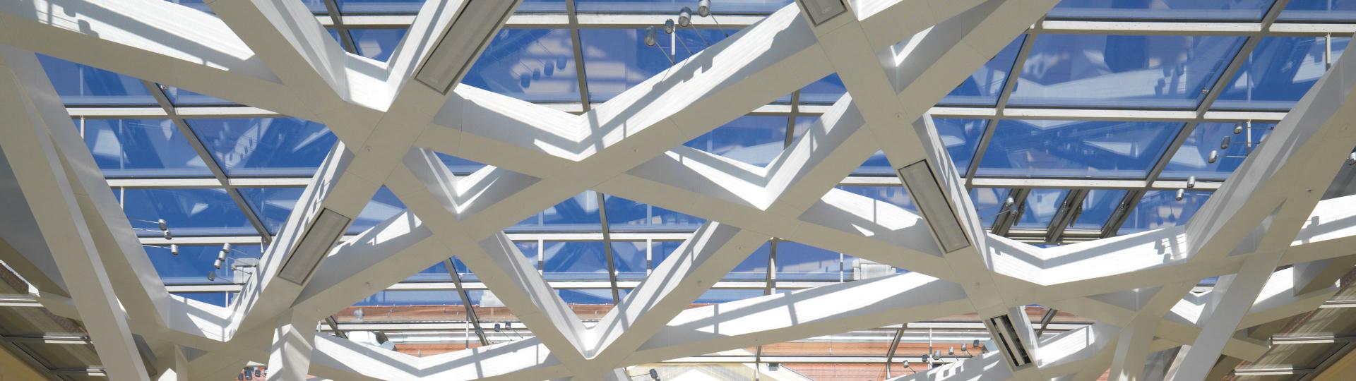 Ceiling of the Glass Courtyard against the blue sky