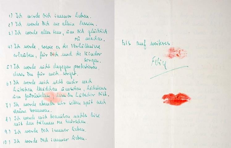 A hand written list of ten promises, sealed with a kiss mark of red lipstick
