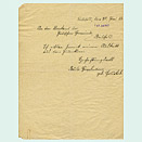 Kurze, in Sütterlinschrift verfasste Mitteilung auf einem Blatt Papier.