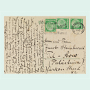 Postkarte mit Adresse und Absender, frankiert mit deutschen Briefmarken