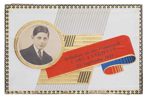 Holzdeckel einer Zigarrenschachtel mit buntem Papier und einem Porträtfoto eines Jungen beklebt.
