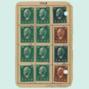 Small vertical-format card with the member‘s name, address and party membership number entered on the front. Contribution stamps featuring a portrait of Chancellor Bismarck have been glued on the back.