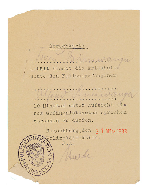 Small horizontal-format form, filled out, bearing the stamp of the Regensburg police department.