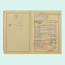Open passport with handwritten entries and stamps