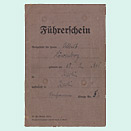 Cover of a gray-colored document with handwritten entries