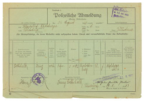 Form, filled out by hand, with an official seal and stamps