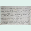 Handwritten sheet of paper in vertical format with folds and stains