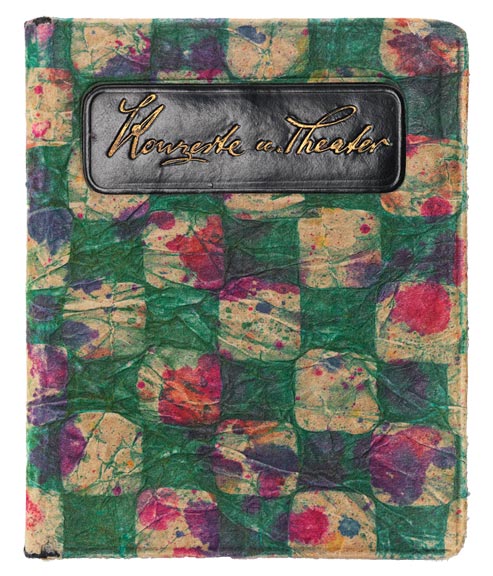 Notebook with a colorful binding embossed with the words "Concerts and Theater"