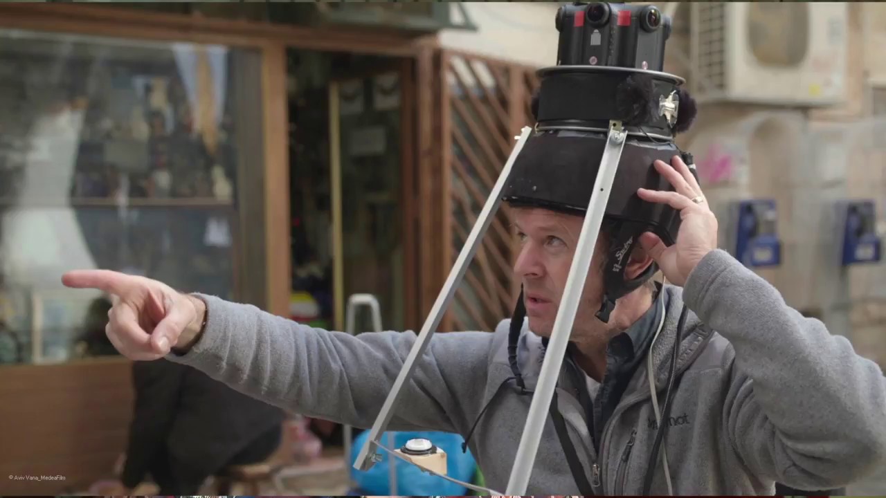 Man with a technical device on his head.