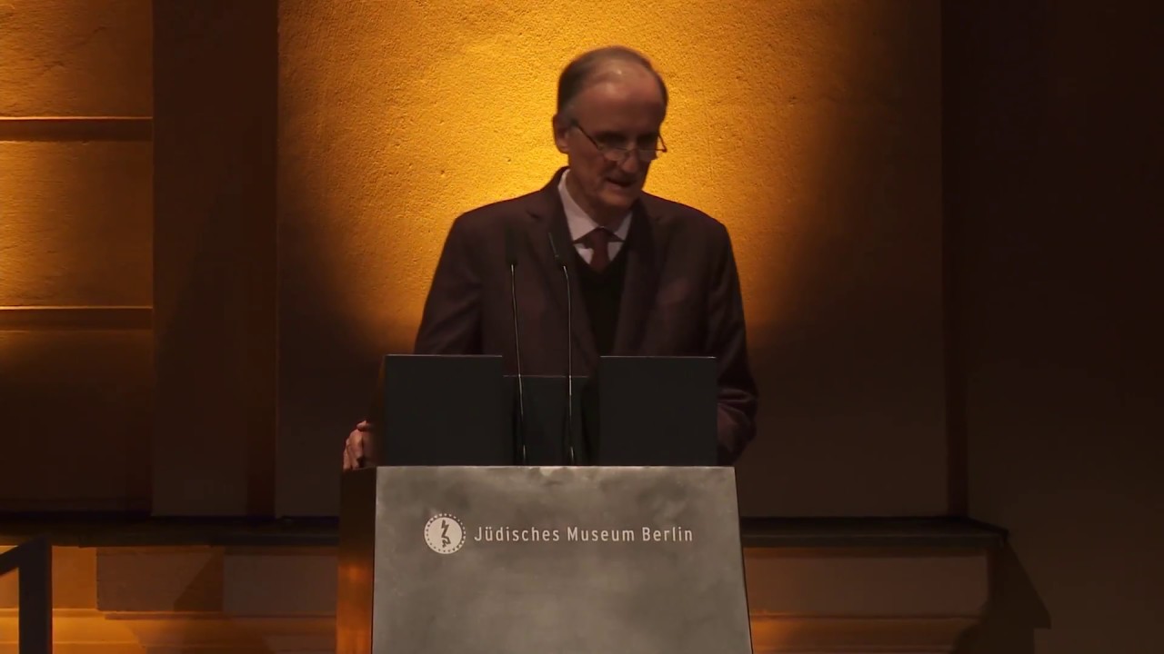 Man speaking at the lectern.