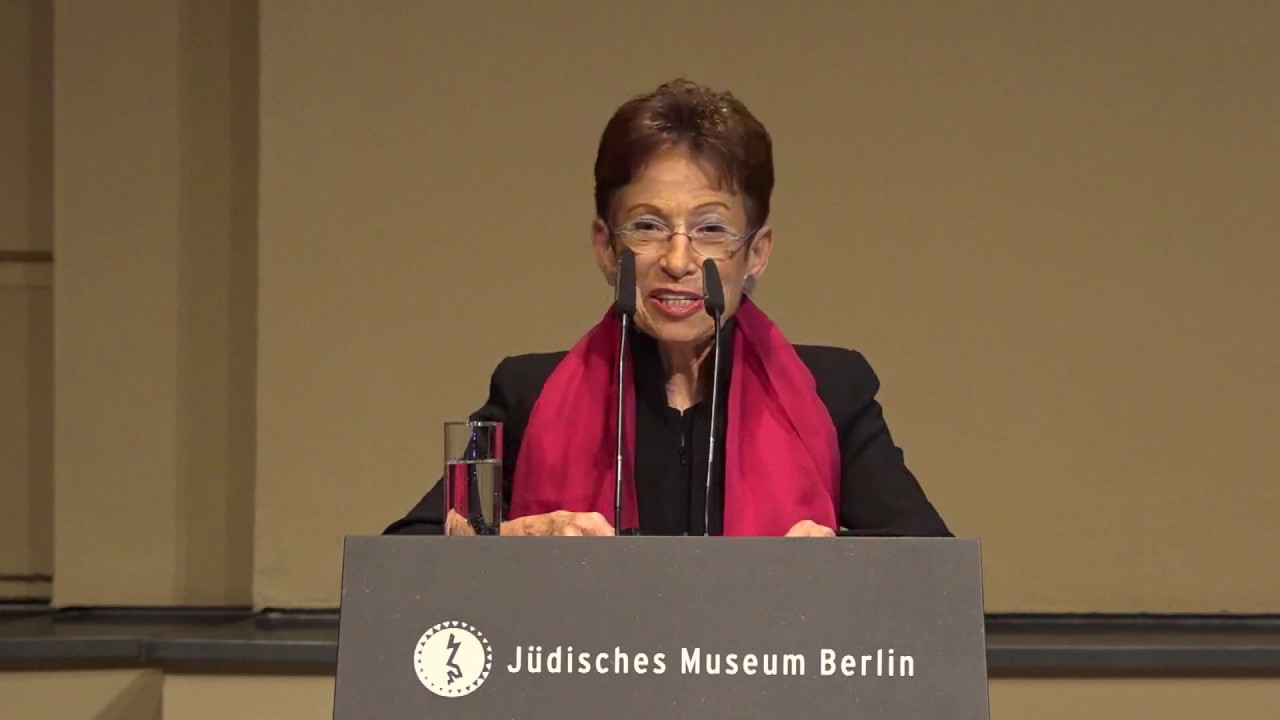 Woman speaking at the lectern.