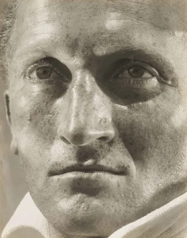 The picture shows the face of a man.