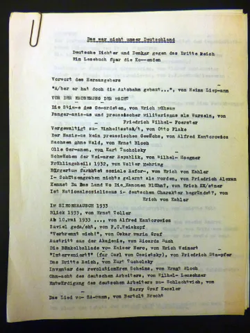 Manuscript stapled together with paper clips, written on a typewriter.