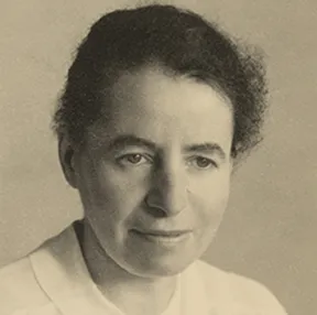 Photographic portrait of a woman with short hair.