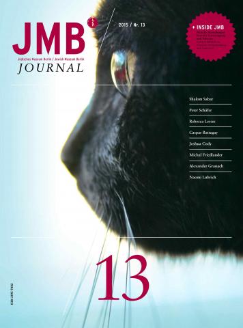 Cover of Journal Thirteen: close up of a side view of a black cat's face