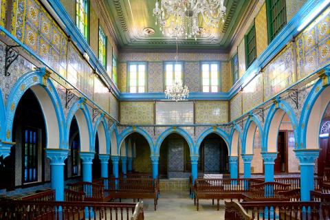 Interior of a richly decorated synagogue.