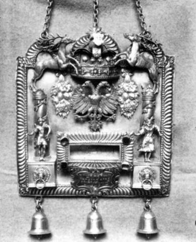 Photographed black and white photograph of Torah sign with deer and other decorations
