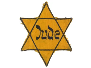 Sechszackiger gelber Stern mit der Aufschrift „Jude“