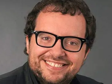 Portrait photo of Dmitrij Belkin.