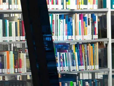 A shelf filled with books.