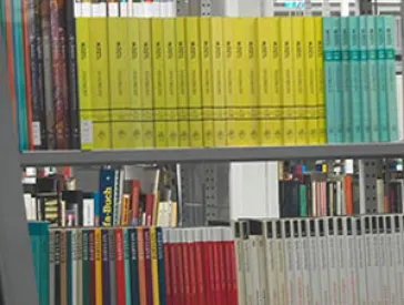 A shelf filled with books.