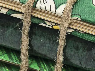 Close-up of fabrics that are bound together.