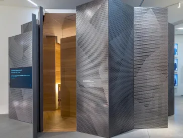 Entrance to a jagged room within the exhibition space.