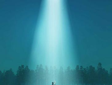 A person stands in a clearing in the cone of light of a UFO flying overhead.