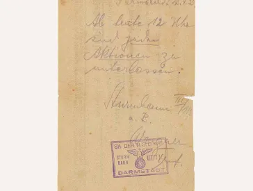 Handwritten note, stamped and signed by SA Troop Leader Wagner. The text reads “Darmstadt, 25 April 1933. From noon today, all actions are to stop.”