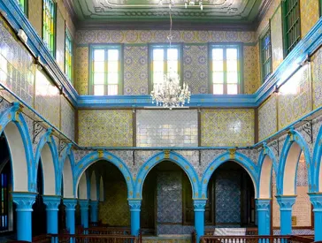 Interior of a richly decorated synagogue.