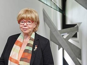 Portrait photo of Cilly Kugelmann, photographed in the Libeskind Building