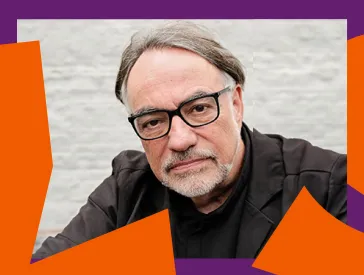 Portrait of a serious looking man with graphic elements in purple and orange as a frame.