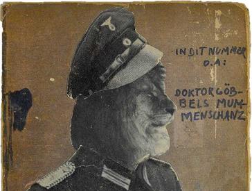 Collage with writing: Doktor Göbbels Mummenschanz. The picture shows a figure in a Nazi military uniform with the head of a lion.